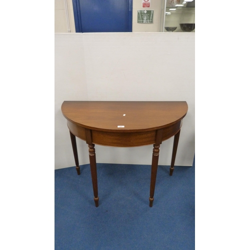 347 - Demi-lune table on fluted supports, nest of three tables with brown skivers and glass tops, on pad f... 