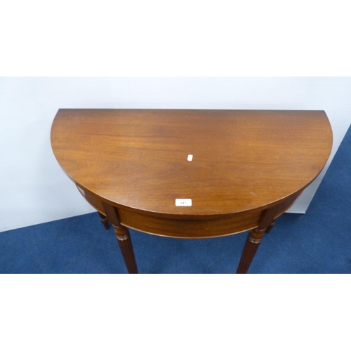 347 - Demi-lune table on fluted supports, nest of three tables with brown skivers and glass tops, on pad f... 