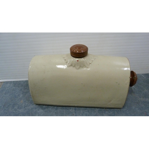 351 - Green enamel bread bin and cover, large metal kitchen jug and two stoneware pigs.  (4)