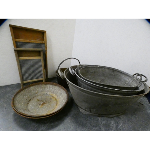 353 - Graduated vintage zinc baths, wash boards and a brass jam pan with iron handle.