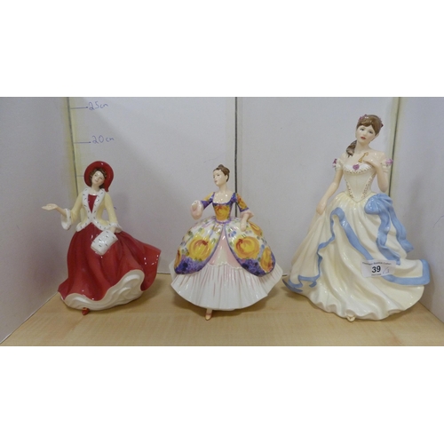 39 - Three Royal Doulton figures, 'Christmas Day 2009', 'Christine' HN 4930 with certificate, and 'Key To... 