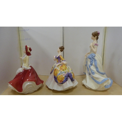 39 - Three Royal Doulton figures, 'Christmas Day 2009', 'Christine' HN 4930 with certificate, and 'Key To... 