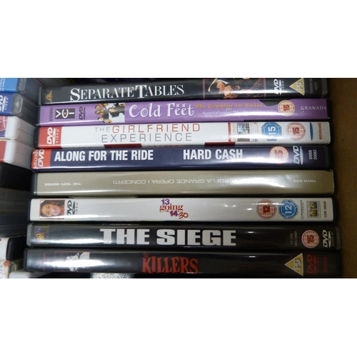 46 - Large collection of DVDs to include movies, TV box sets etc.