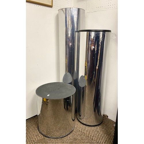 531 - Three chrome effect cylindrical display stands graduated in size