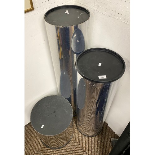 531 - Three chrome effect cylindrical display stands graduated in size