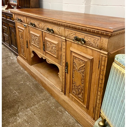 622 - Oak intricately carved sideboard