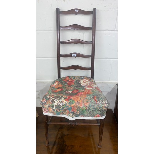 689 - Mahogany ladder back chair with floral upholstery