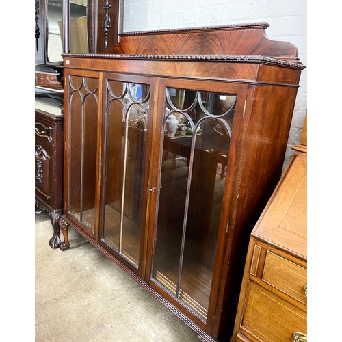 612 - Mahogany glazed three door bookcase