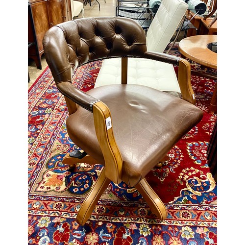 601 - Leather swivel office chair