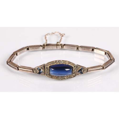 102 - Silver bracelet set with a large blue gemstone surrounded by white and smaller blue, gross weight 10... 