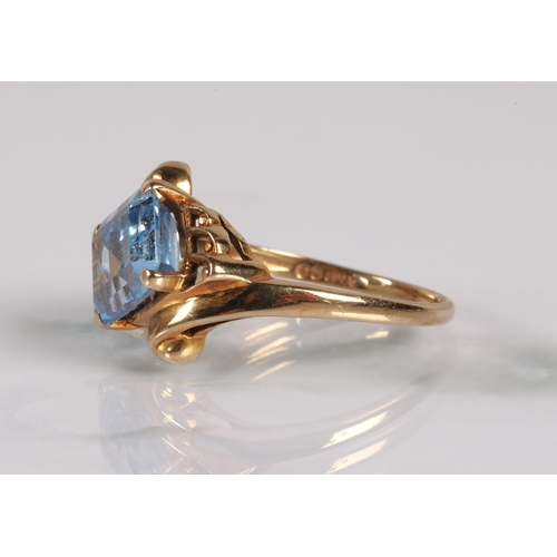 126 - 9ct gold ring set with a blue colour gemstone, ring size R, 3.2g