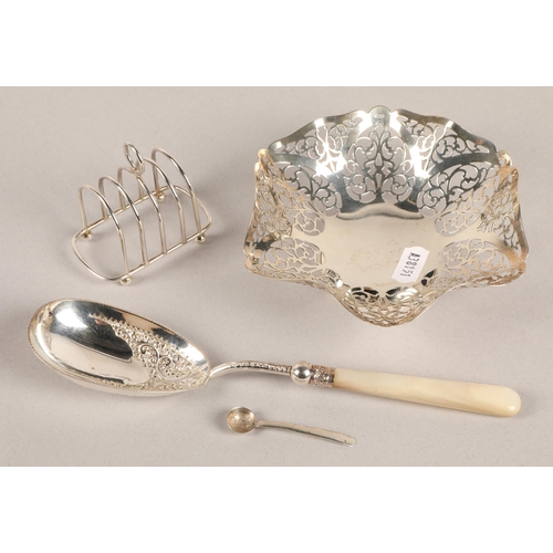 174 - Silver basket Birmingham 1937, silver toast rack, and silver banded serving spoon, gross weight of b... 