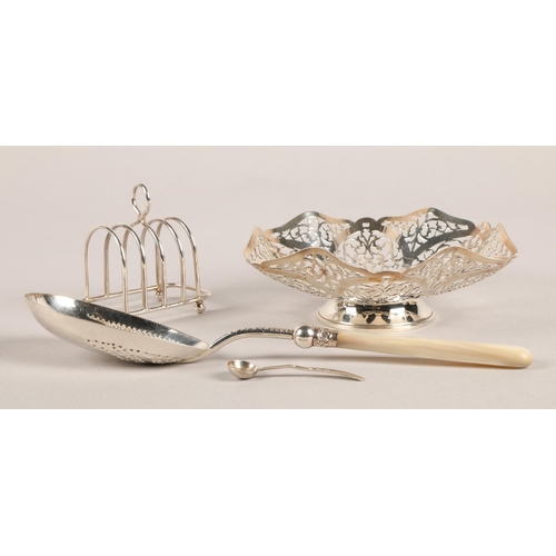 174 - Silver basket Birmingham 1937, silver toast rack, and silver banded serving spoon, gross weight of b... 