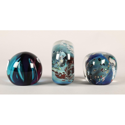 24 - Three glass paperweights to include Caithness 'Scimitar' and two Rollin Karg (3)