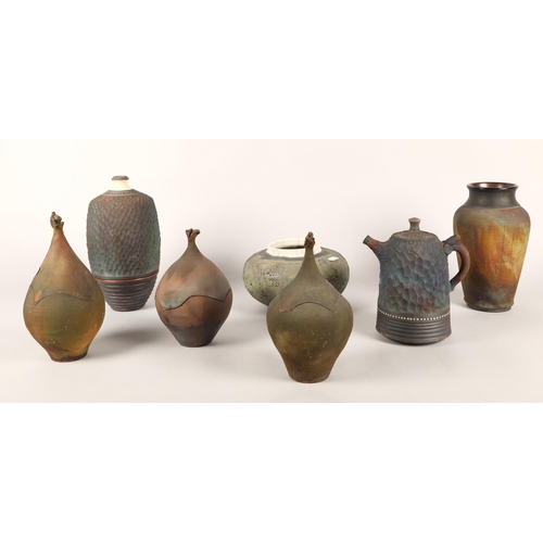 283 - Seven pieces of Studio Pottery to include Don Nibert Raku ware, vases, tea pot etc.  (7)