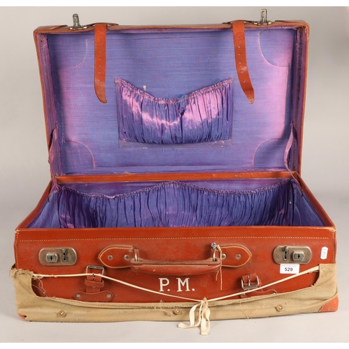 529 - Leather vintage travel case with outer canvas cover.