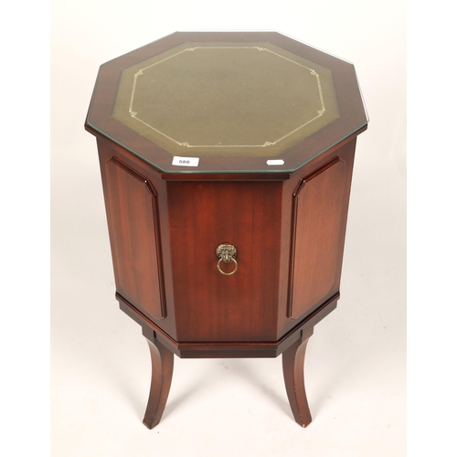 588 - Mahogany octagonal cabinet