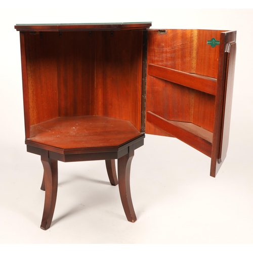 588 - Mahogany octagonal cabinet