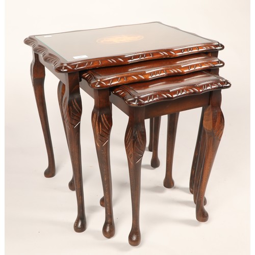 590 - Nest of three mahogany tables