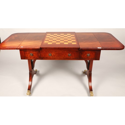 593 - Wade extendable three drawer mahogany games table