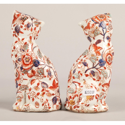 244 - Pair of Imari patterned cats, marks to base, 19cm h.