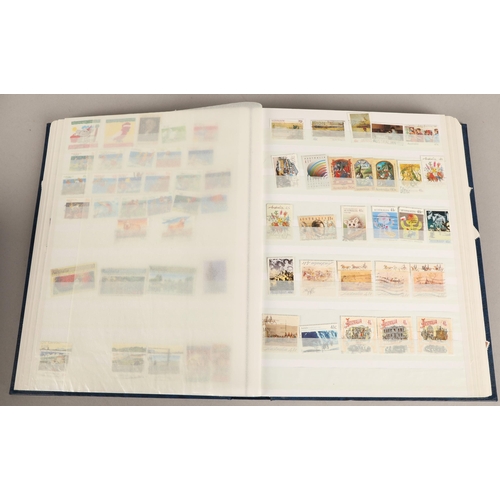 261 - Assortment of three stamp albums and two empty albums, to include, Brazil, Canada, Bermuda etc. (5)&... 