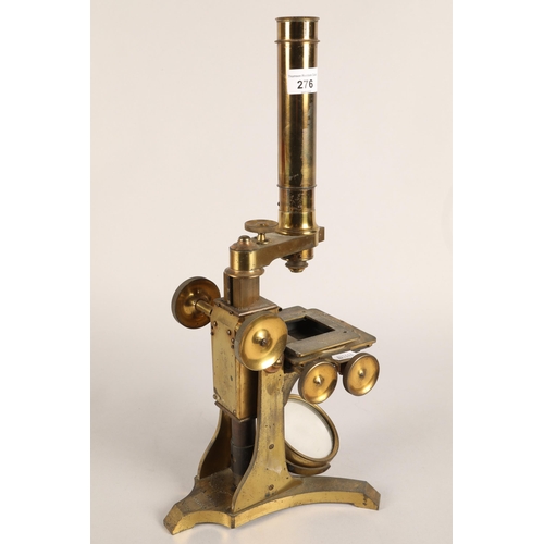 276 - Brass microscope A. Ross London No. 324, with two drawer accessory cabinet containing lenses, slides... 