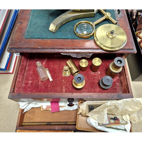 276 - Brass microscope A. Ross London No. 324, with two drawer accessory cabinet containing lenses, slides... 