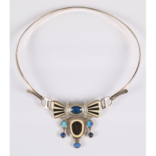 171 - Robert Crerar (Scottish) Silver torque necklace with opals, inlaid fans and drop, approximately 67.5... 