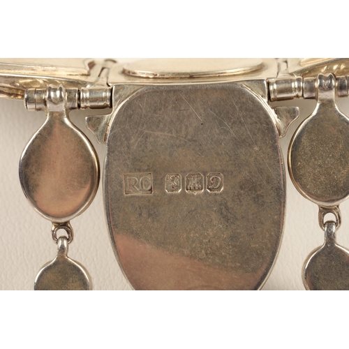 171 - Robert Crerar (Scottish) Silver torque necklace with opals, inlaid fans and drop, approximately 67.5... 