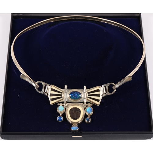 171 - Robert Crerar (Scottish) Silver torque necklace with opals, inlaid fans and drop, approximately 67.5... 