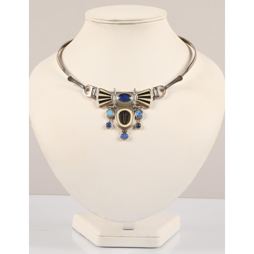 171 - Robert Crerar (Scottish) Silver torque necklace with opals, inlaid fans and drop, approximately 67.5... 