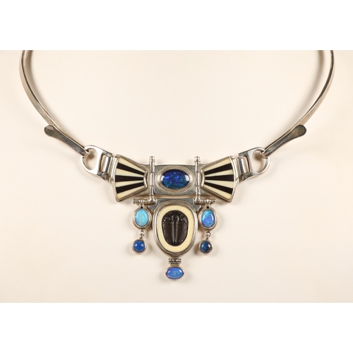 171 - Robert Crerar (Scottish) Silver torque necklace with opals, inlaid fans and drop, approximately 67.5... 