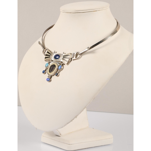 171 - Robert Crerar (Scottish) Silver torque necklace with opals, inlaid fans and drop, approximately 67.5... 