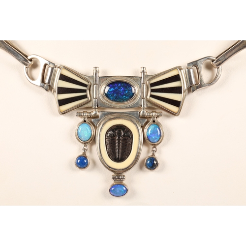 171 - Robert Crerar (Scottish) Silver torque necklace with opals, inlaid fans and drop, approximately 67.5... 