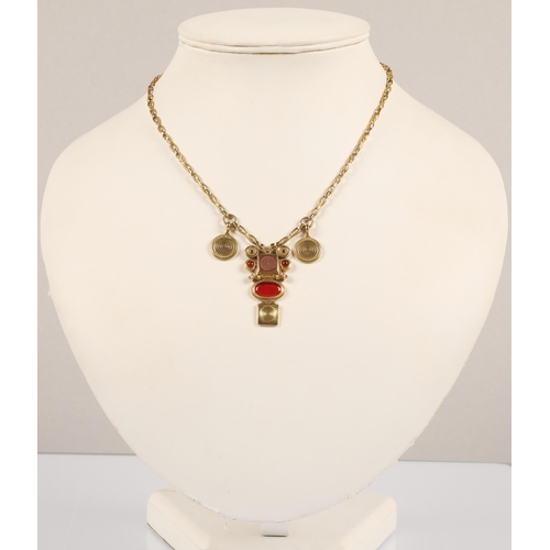 172 - Robert Crerar (Scottish) 18ct gold necklace of Egyptian inspiration with amber-style stone and whorl... 