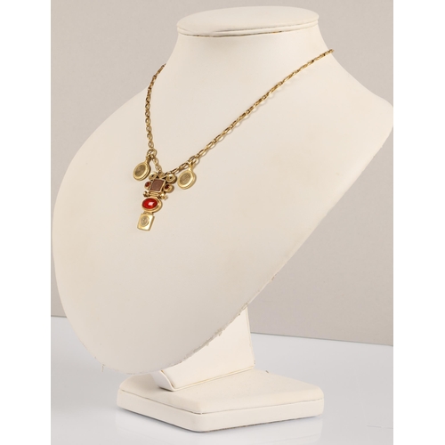 172 - Robert Crerar (Scottish) 18ct gold necklace of Egyptian inspiration with amber-style stone and whorl... 