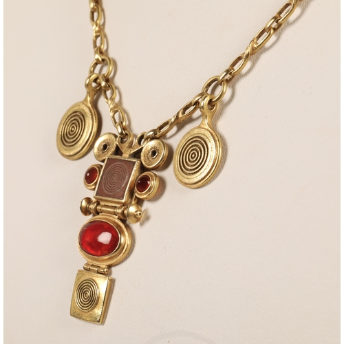 172 - Robert Crerar (Scottish) 18ct gold necklace of Egyptian inspiration with amber-style stone and whorl... 