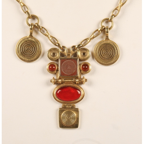 172 - Robert Crerar (Scottish) 18ct gold necklace of Egyptian inspiration with amber-style stone and whorl... 