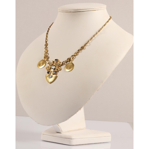 175 - Robert Crerar (Scottish) 18ct gold necklace of Egyptian inspiration with spear-shaped drop set with ... 