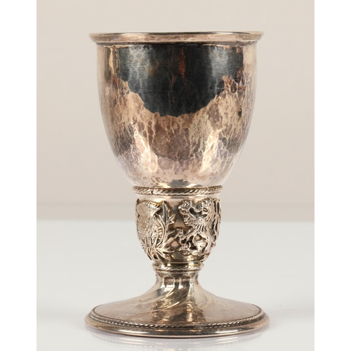 93 - Omar Ramsden, London (1873 - 1939)Silver goblet with ovoid bowl with flared lip, ovoid knop with emb... 