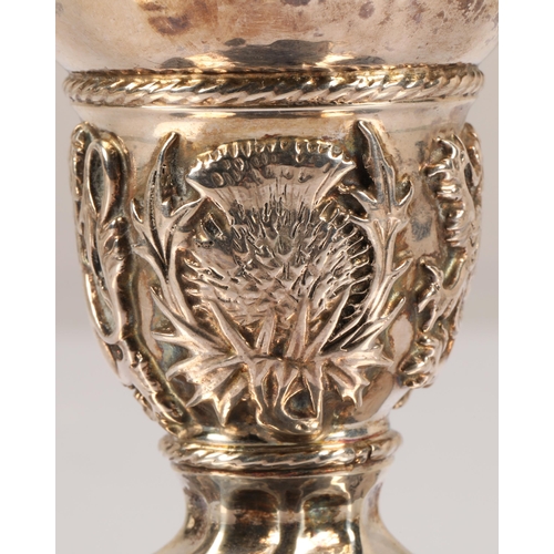 93 - Omar Ramsden, London (1873 - 1939)Silver goblet with ovoid bowl with flared lip, ovoid knop with emb... 