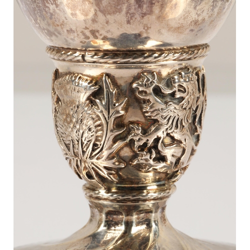 93 - Omar Ramsden, London (1873 - 1939)Silver goblet with ovoid bowl with flared lip, ovoid knop with emb... 