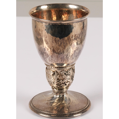 93 - Omar Ramsden, London (1873 - 1939)Silver goblet with ovoid bowl with flared lip, ovoid knop with emb... 