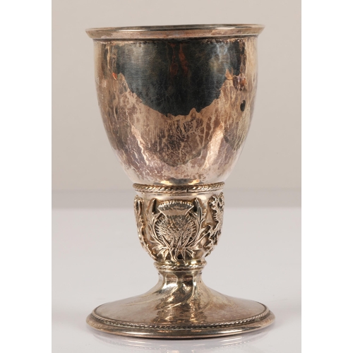 93 - Omar Ramsden, London (1873 - 1939)Silver goblet with ovoid bowl with flared lip, ovoid knop with emb... 