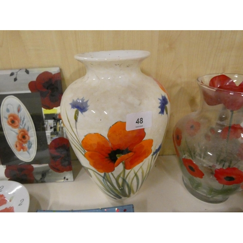 48 - Large box of poppy ceramics to include vases, mirror, clock, mugs etc.