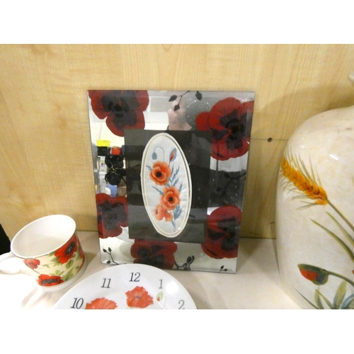 48 - Large box of poppy ceramics to include vases, mirror, clock, mugs etc.