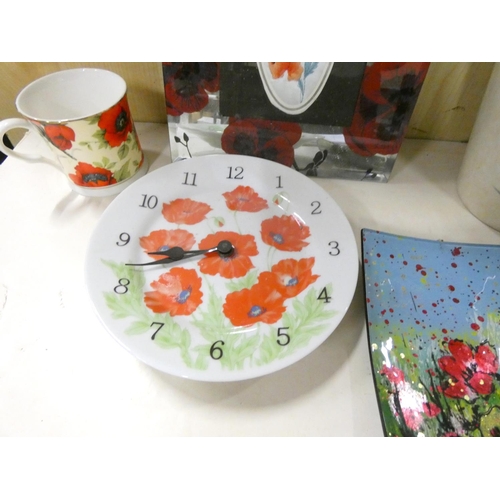 48 - Large box of poppy ceramics to include vases, mirror, clock, mugs etc.