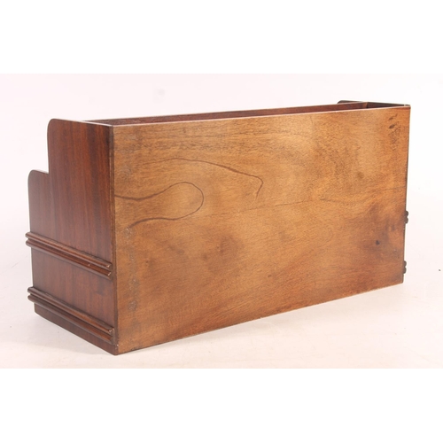 24 - 1930s mahogany stationery rack, 36cm wide.