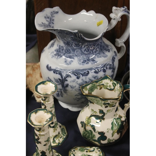 44 - Blue and white pottery jug, a Masons Chartreuse jug, candlestick and dish, and other ceramics.